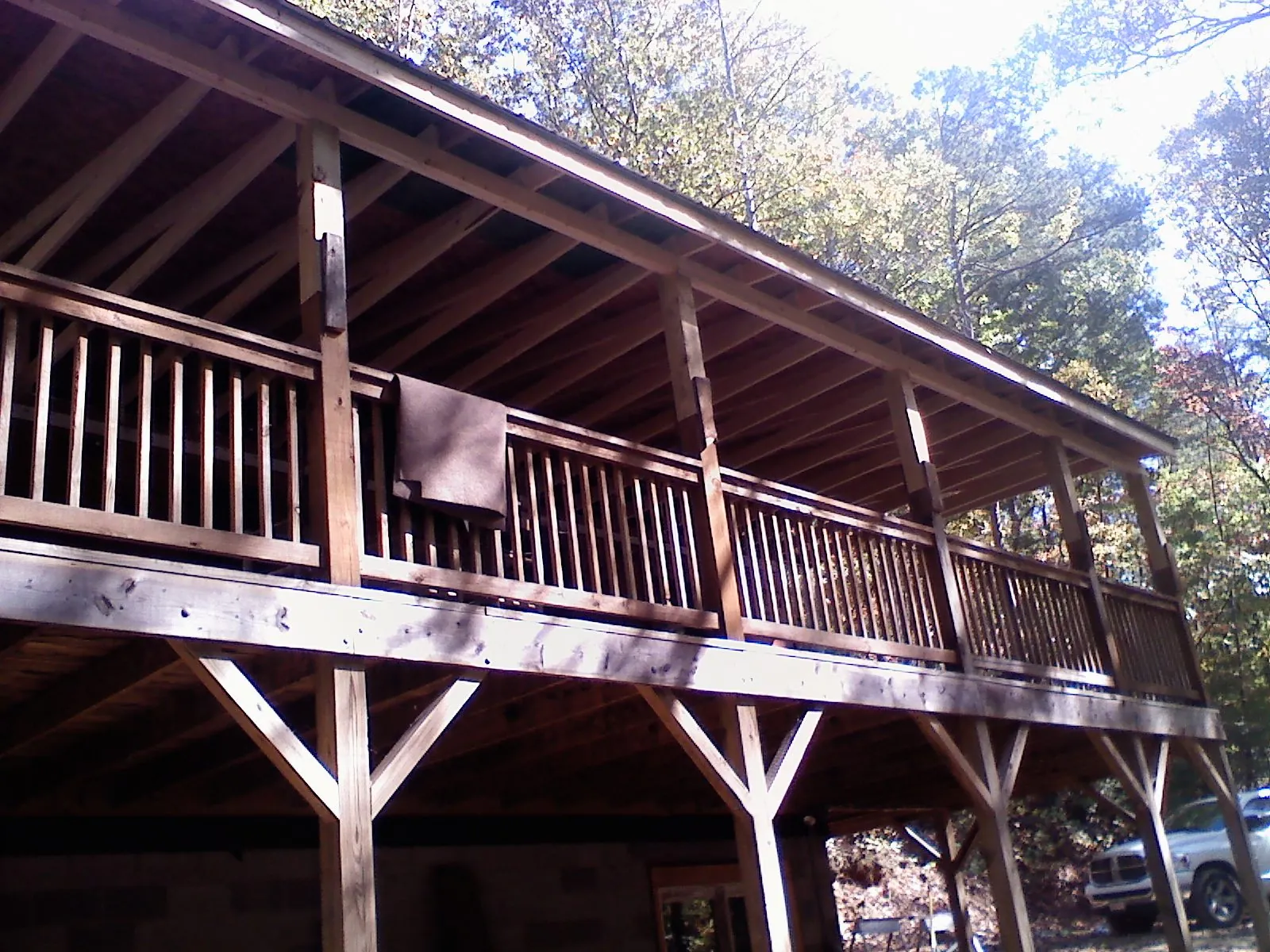 Timber framing under a new elevated porch and deck — Roof Leak Repair in Worcester by Roofing Brothers